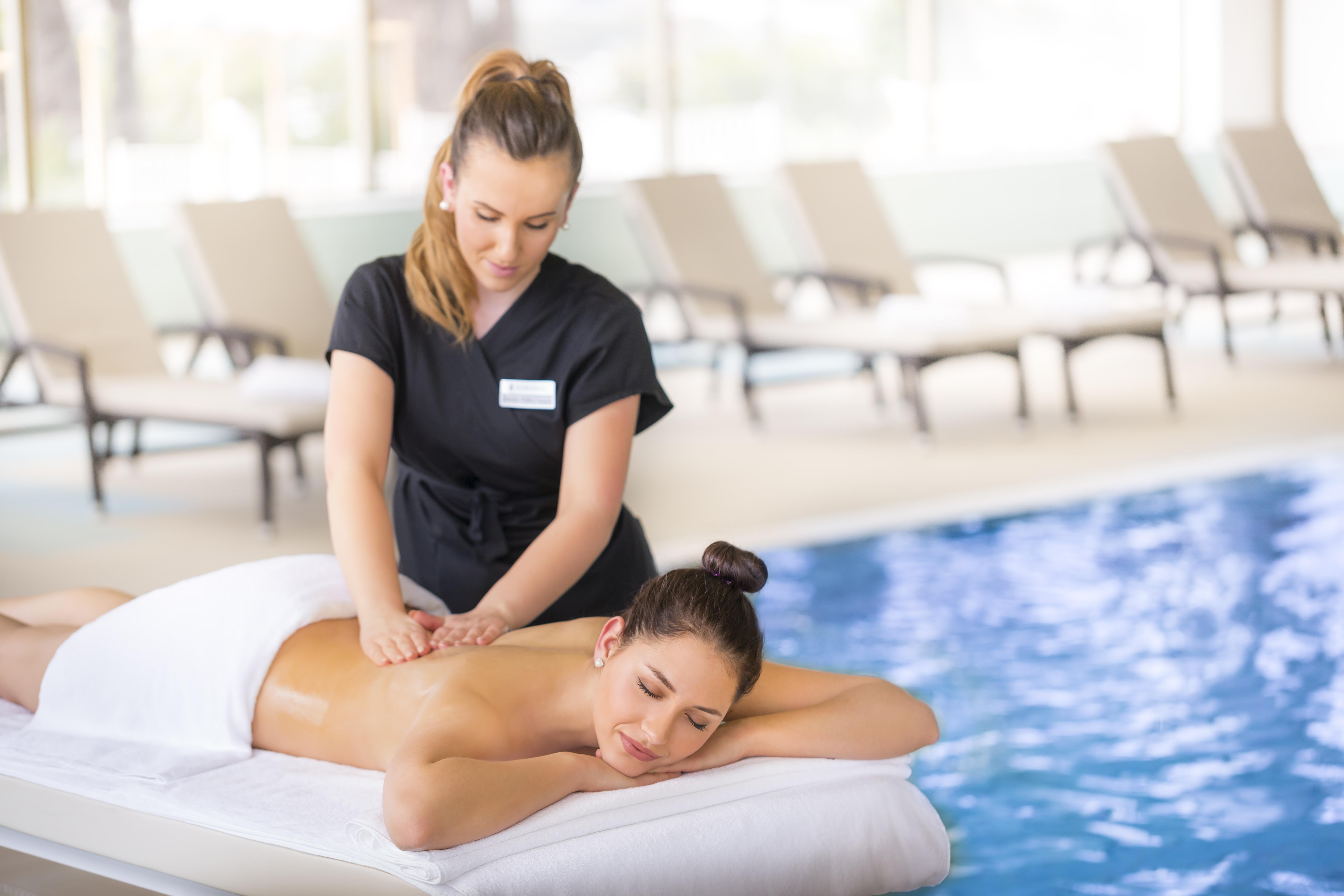 Remisens Hotel Metropol Portoroz Exterior photo Massage therapist working on a woman's back